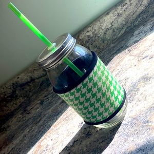 Mason jar drink with lid, straw, and neoprene type wrap